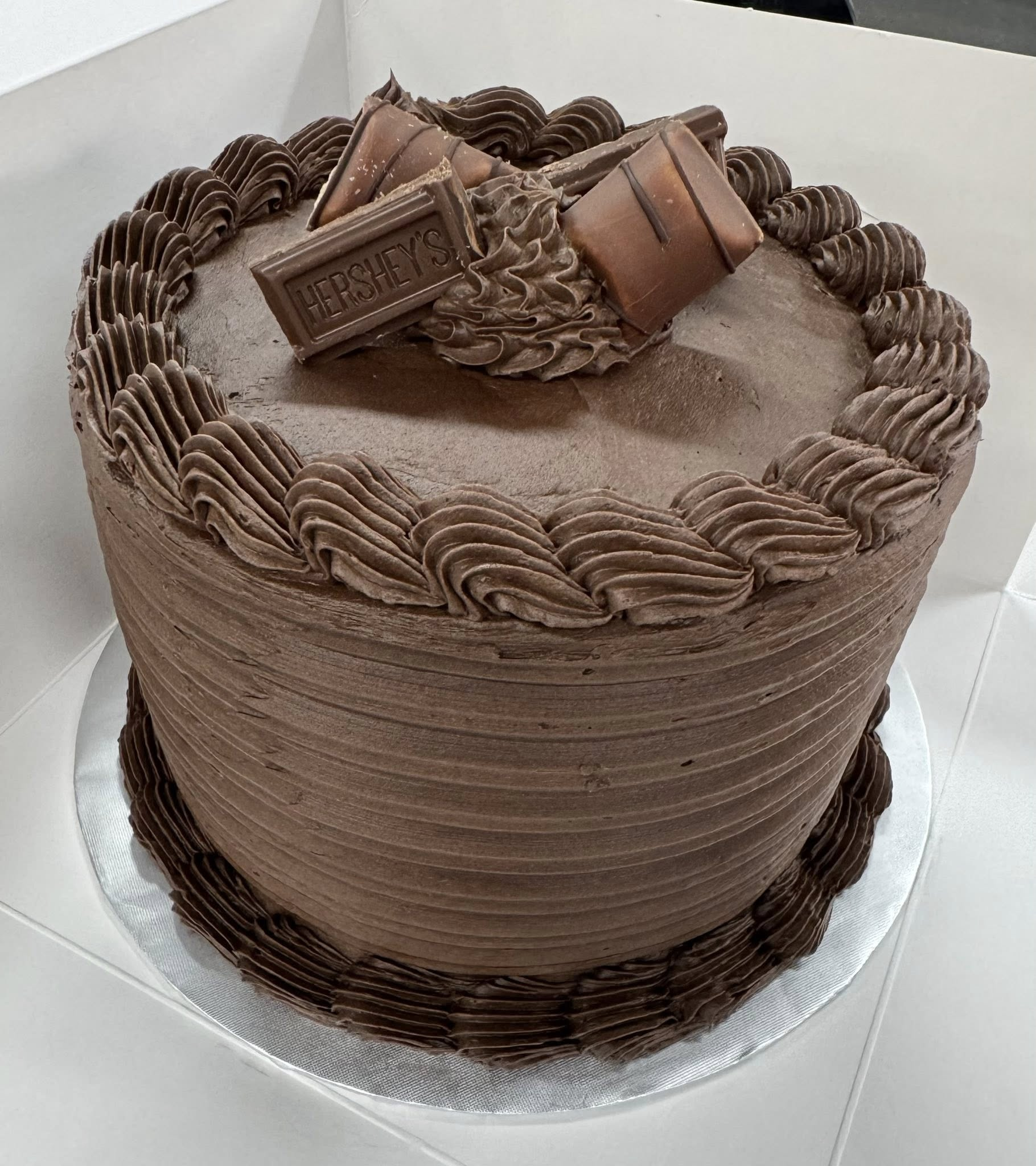 Rich chocolate tiered wedding cake